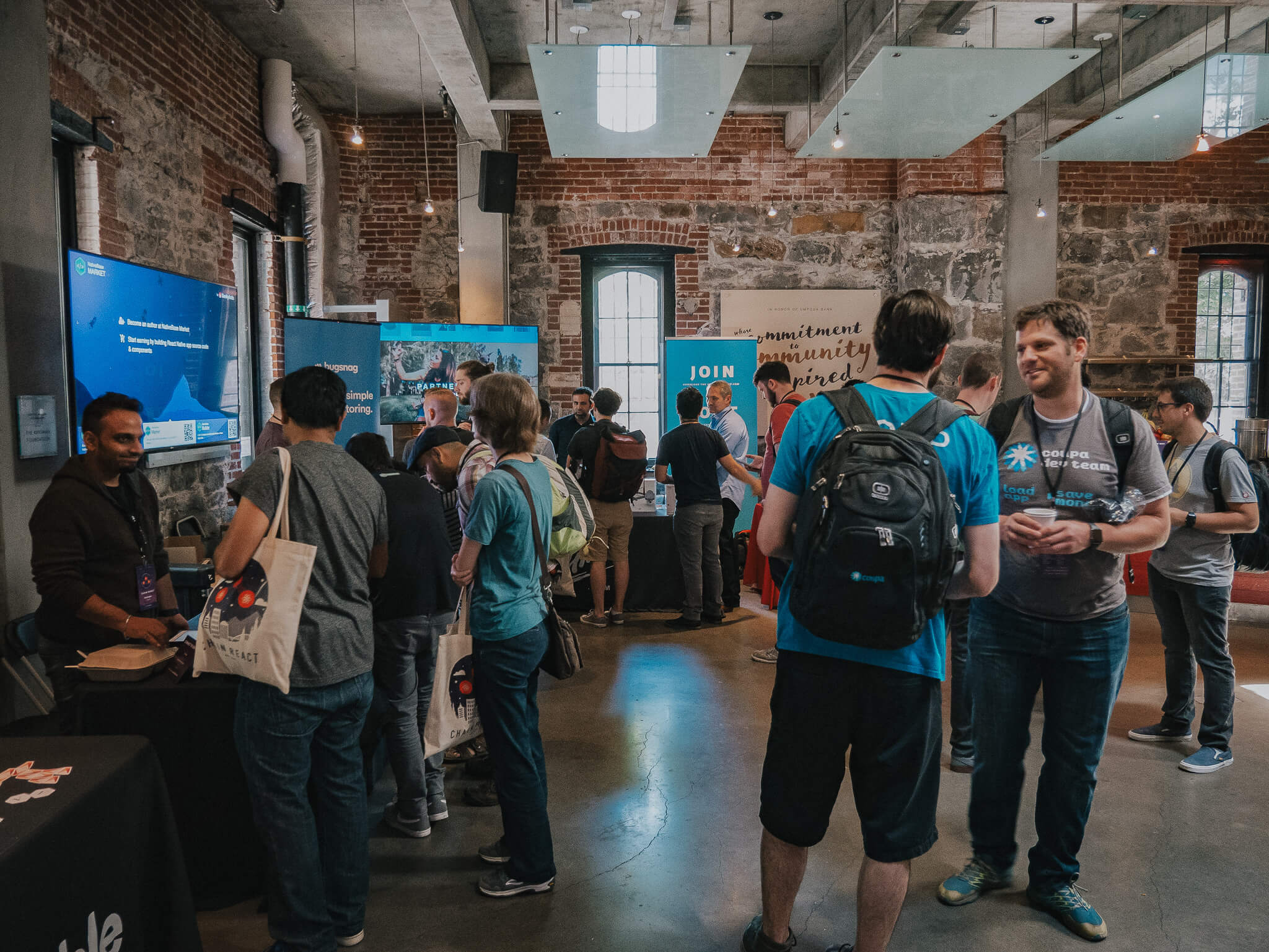Chain React conference attendees in the venue
